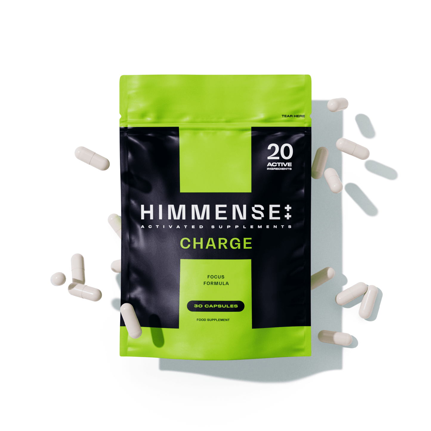 Himmense CHARGE supplement package with scattered capsules for enhanced cognitive function, alertness, concentration, energy, and stamina.